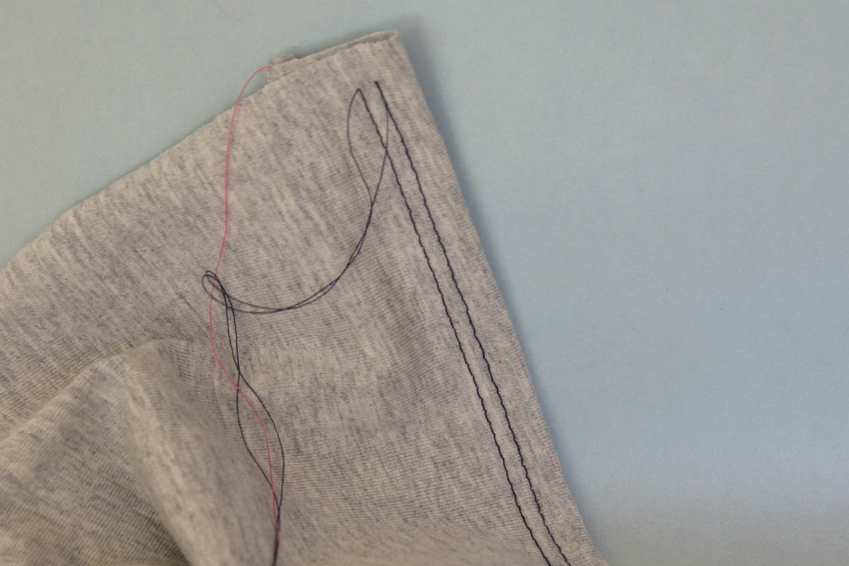 Noticed this loose/unravelled thread along the stitching on