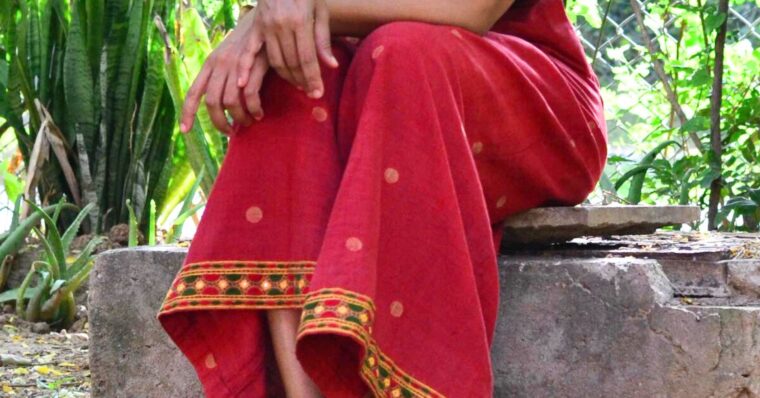 Close up of red palazzo pants.